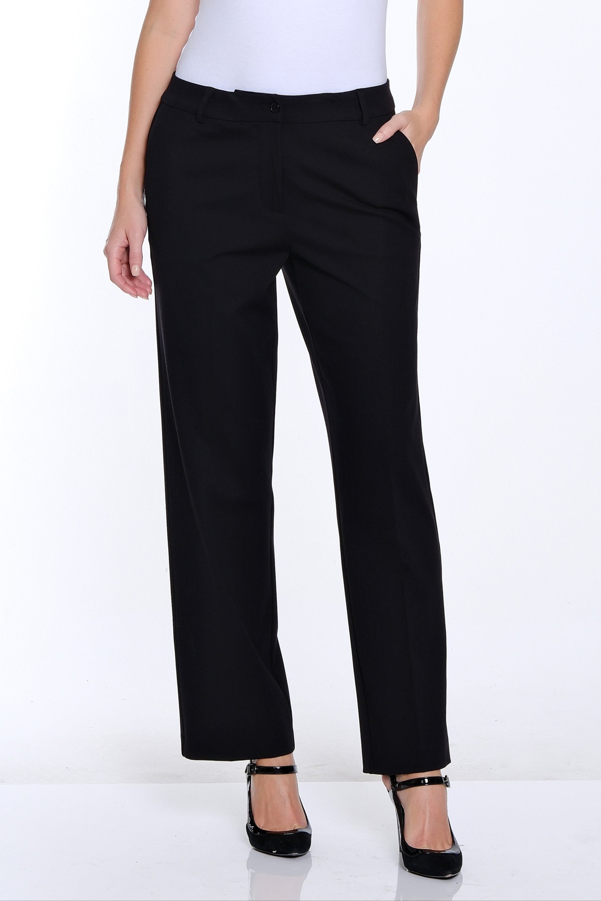 Woman wearing a white t-shirt and black pants on a white background